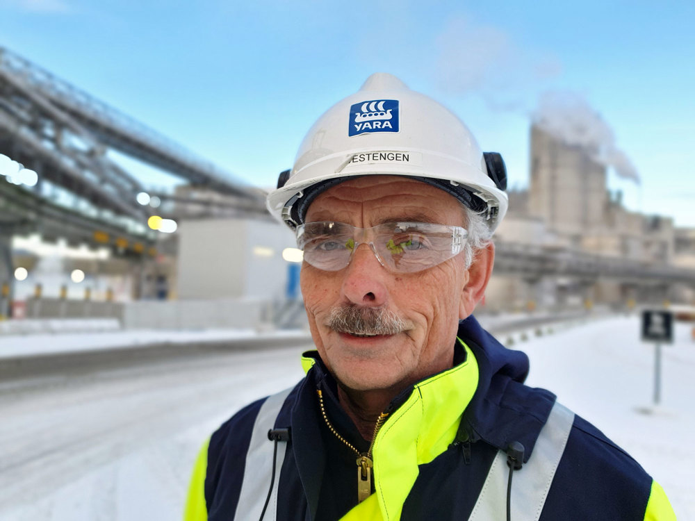 portrait of man, working clothes, helmet, industry