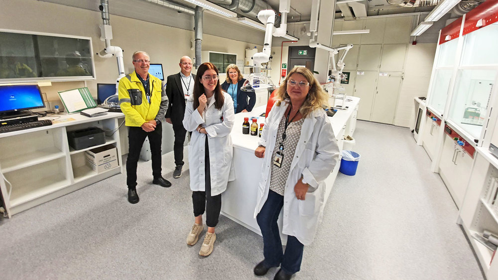 employees in new white lab